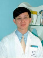 Dr.Surakit Wisutwatanakorn, Implantologist, Implant Dentist and Oral and Maxillofacial Surgeons in Bangkok Thailand